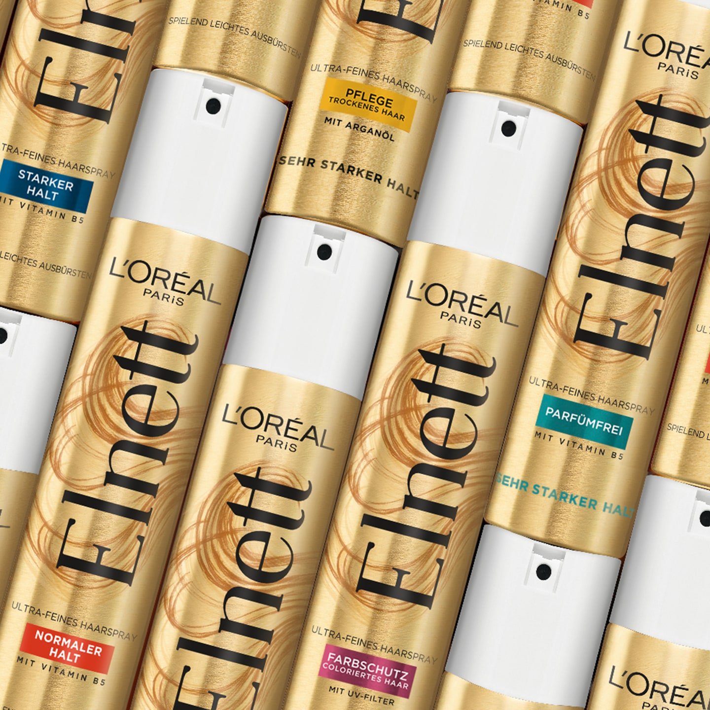 Verschiedene Elnett Haarsprays nebeneinander liegend